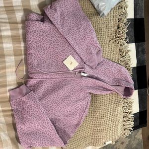 Fabletics purple cheetah print onesie